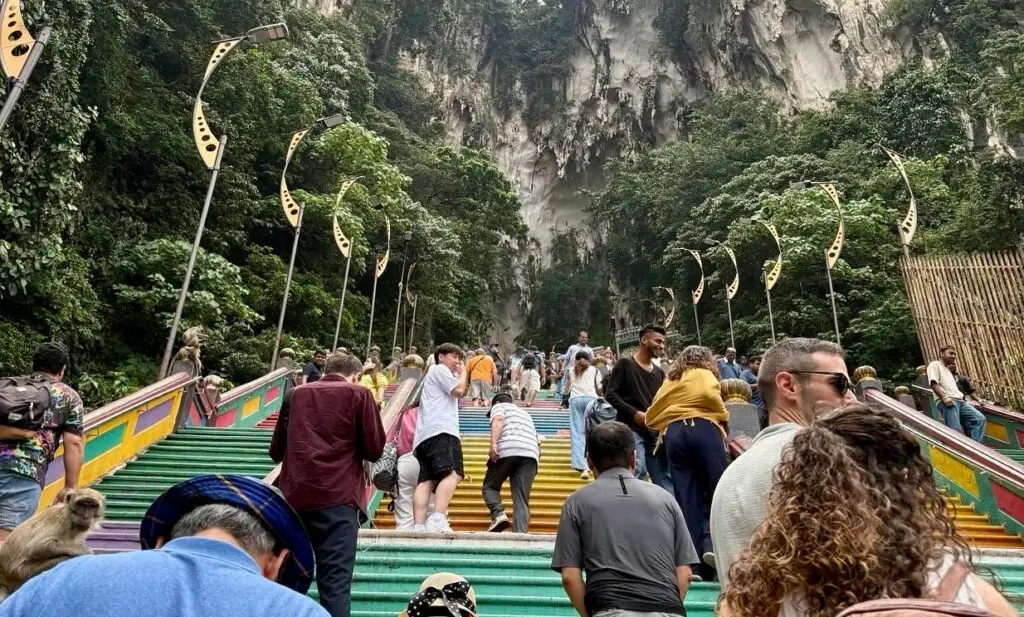 One Mission students climbing steps in a foreign country